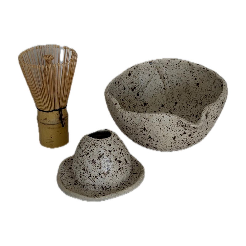 Matcha set II, a handbuilt speckled ceramic bowl with a bamboo whisk and a whisk rest