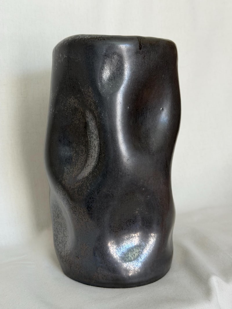 Platinum effect vase, a handbuilt ceramic vessel with a metallic platinum glaze, 9 in tall