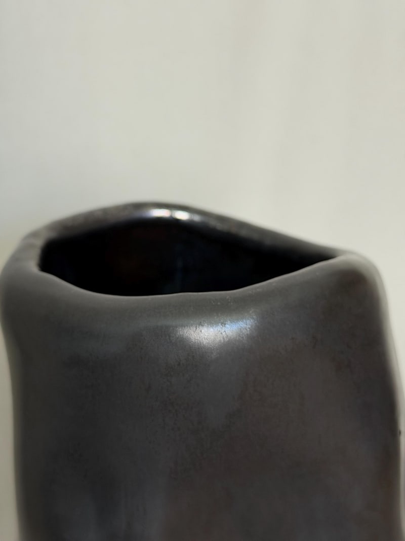Platinum effect vase, a handbuilt ceramic vessel with a metallic platinum glaze, 9 in tall