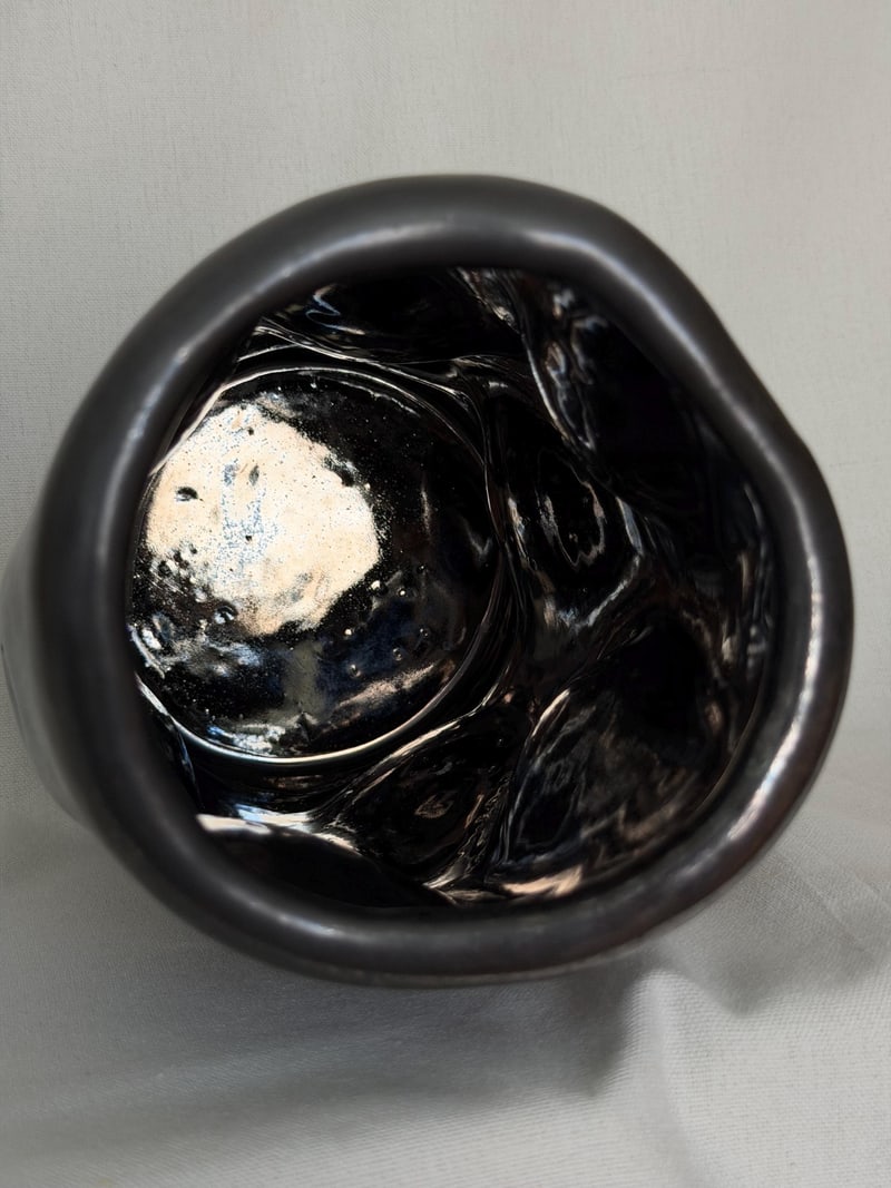 Platinum effect vase, a handbuilt ceramic vessel with a metallic platinum glaze, 9 in tall